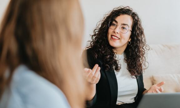 Two associates talking to each other